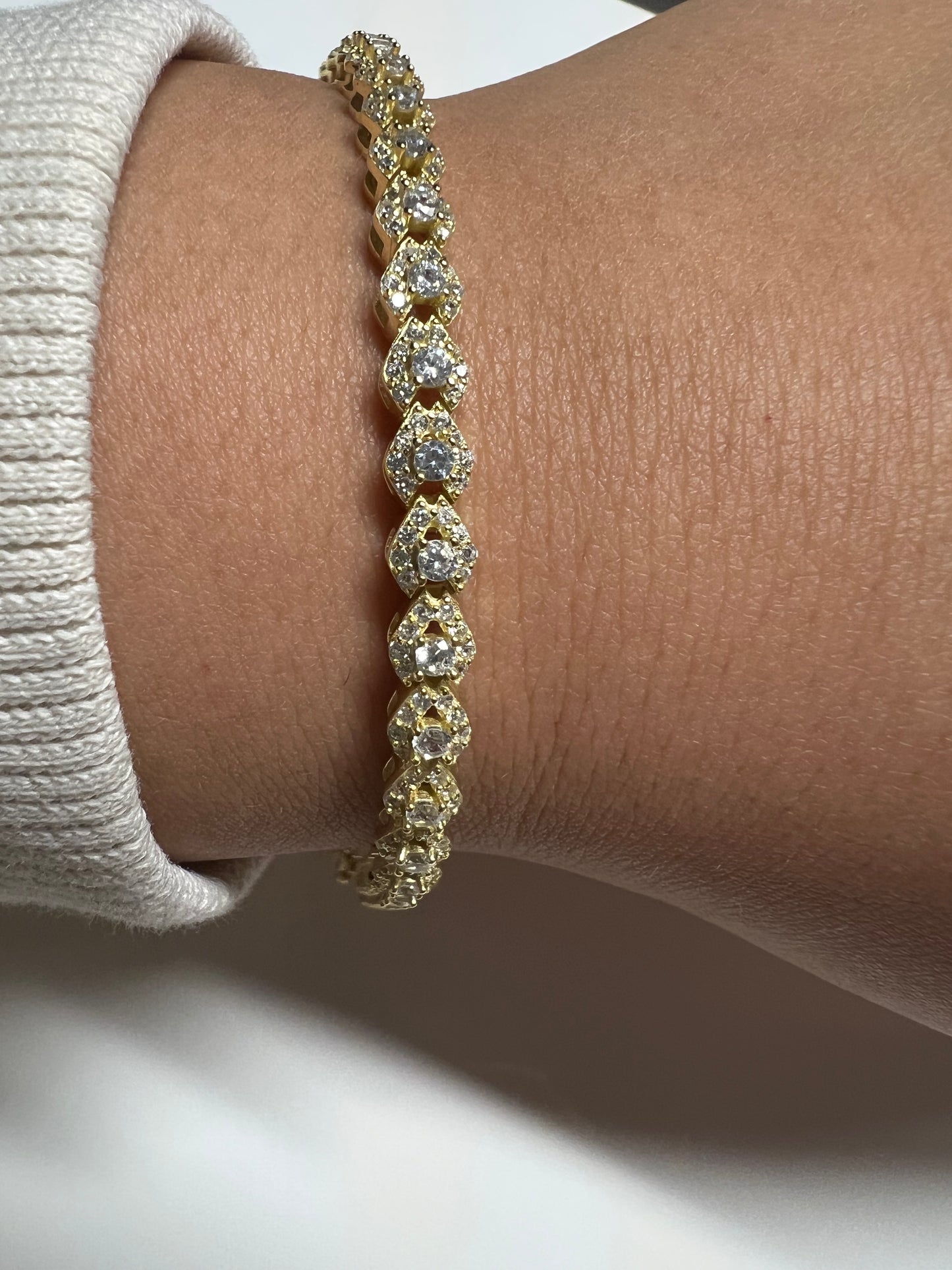 Cluster tennis bracelet
