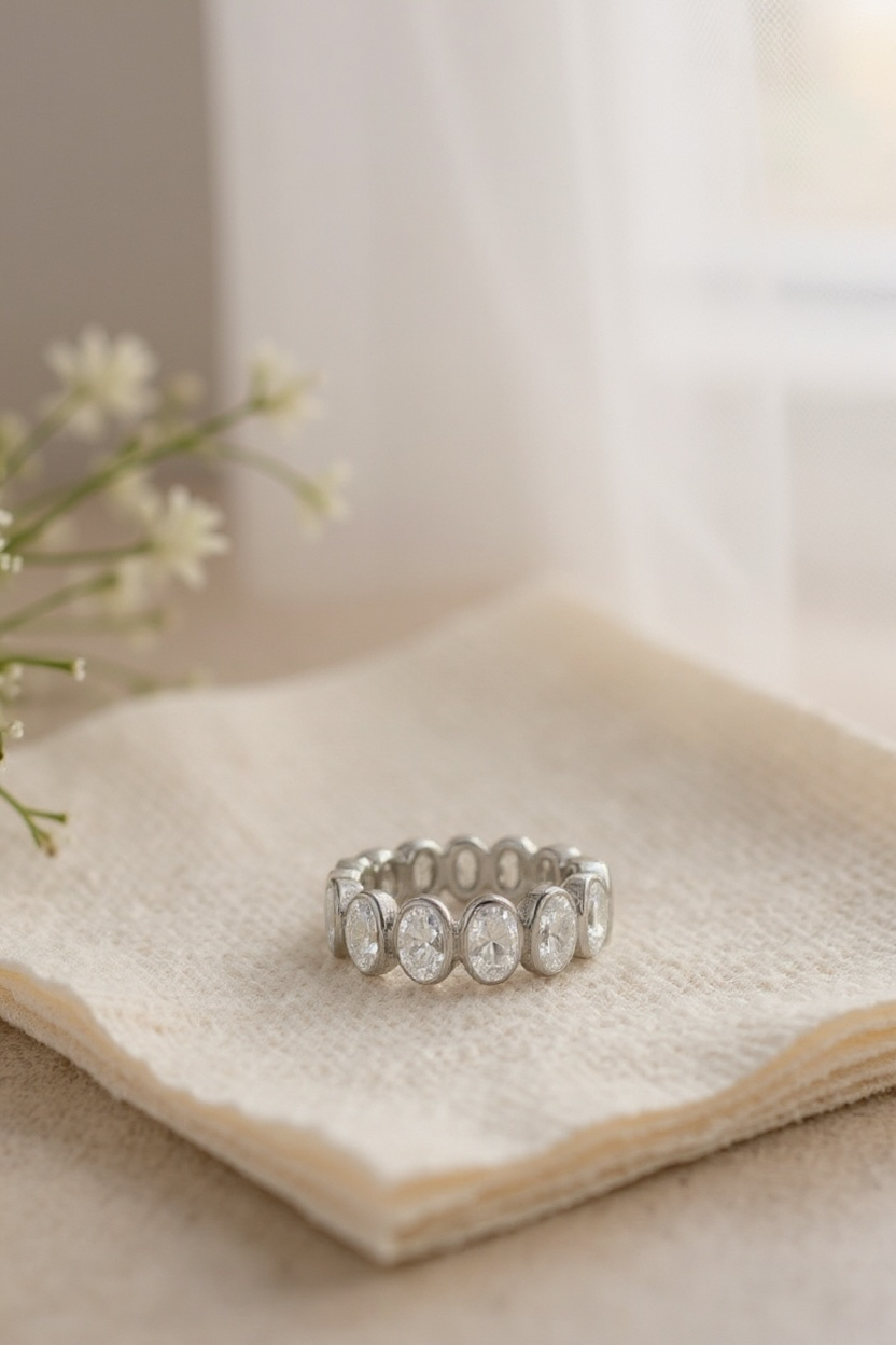 Oval bezel eternity band